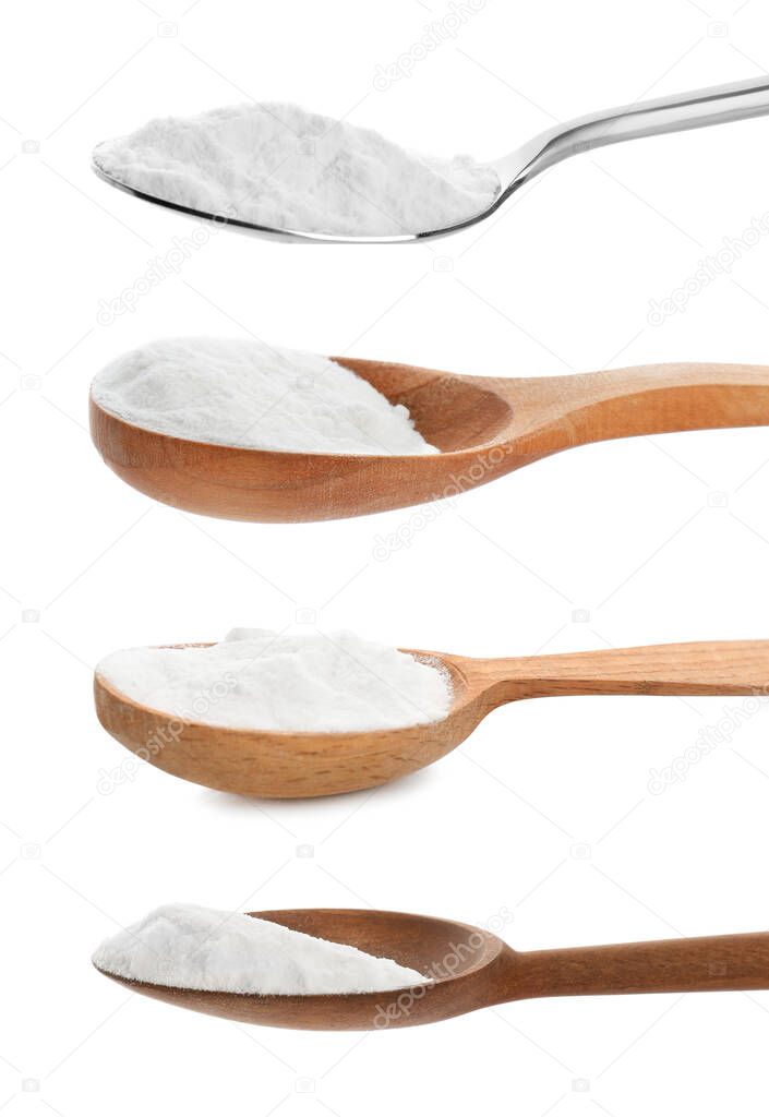 Set with spoons of baking soda on white background