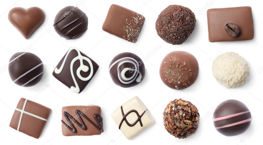 Set with different chocolate candies on white background, top view. Banner design