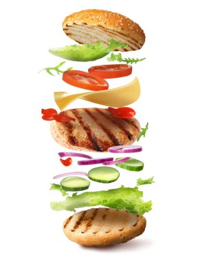 Beyaz arka planda farklı uçuş malzemeleri olan lezzetli bir burger.