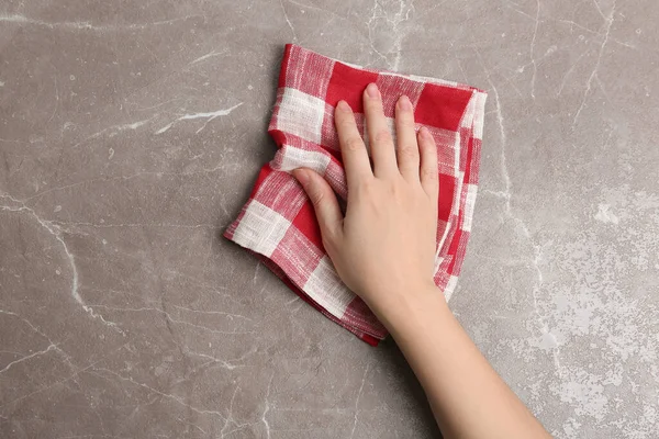 Woman Wiping Brown Marble Table Kitchen Towel Top View — Stock Photo, Image
