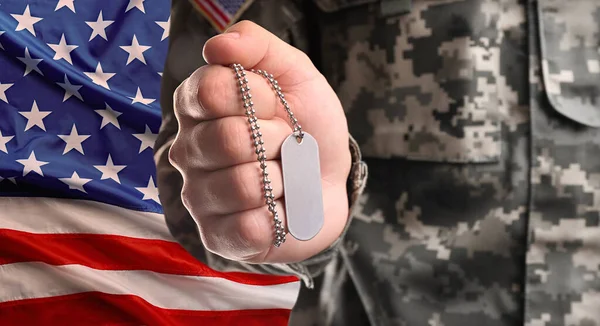 Male Soldier Holding Military Tag American Flag Background Closeup Military — Stock Photo, Image