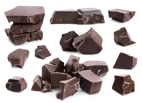 Set with pieces of delicious chocolate on white background 