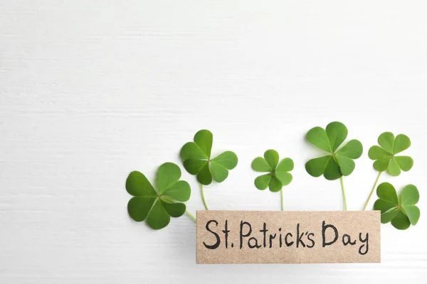 Clover Leaves Card Text Patrick Day White Wooden Table Flat — Stock Photo, Image