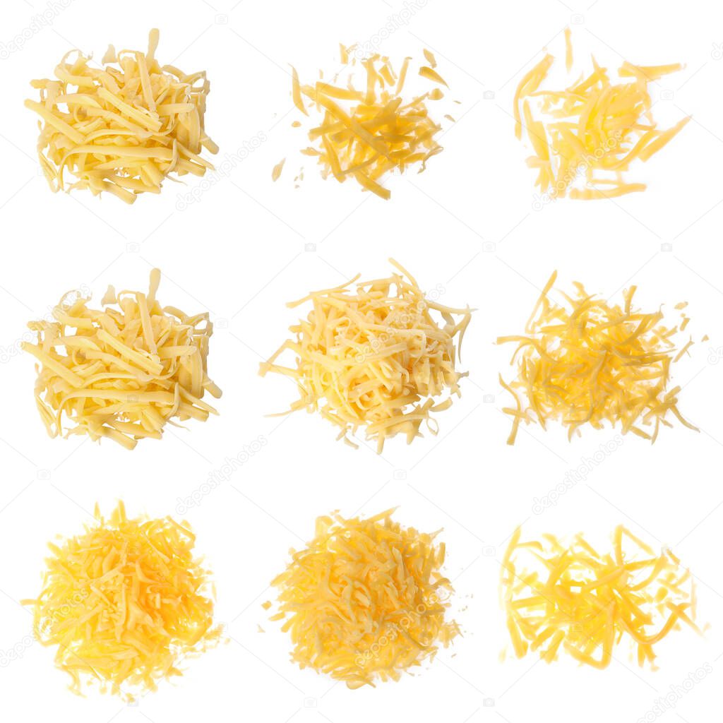 Set with grated cheese on white background, top view