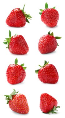 Beyaz arka planda lezzetli çileklerle ayarlanmış.