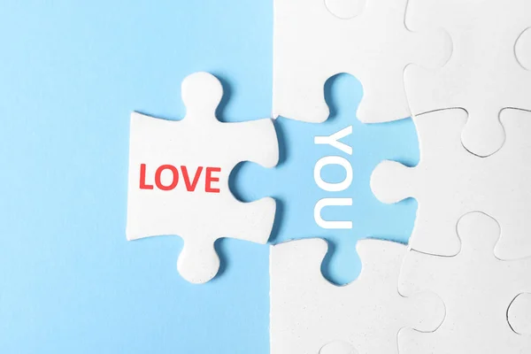 Puzzel Met Zin Love You Lichtblauwe Achtergrond Bovenaanzicht — Stockfoto