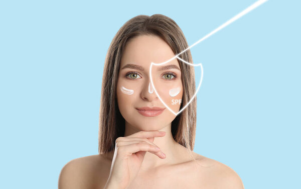 SPF shield and beautiful young woman with healthy skin on blue background. Sun protection cosmetic product