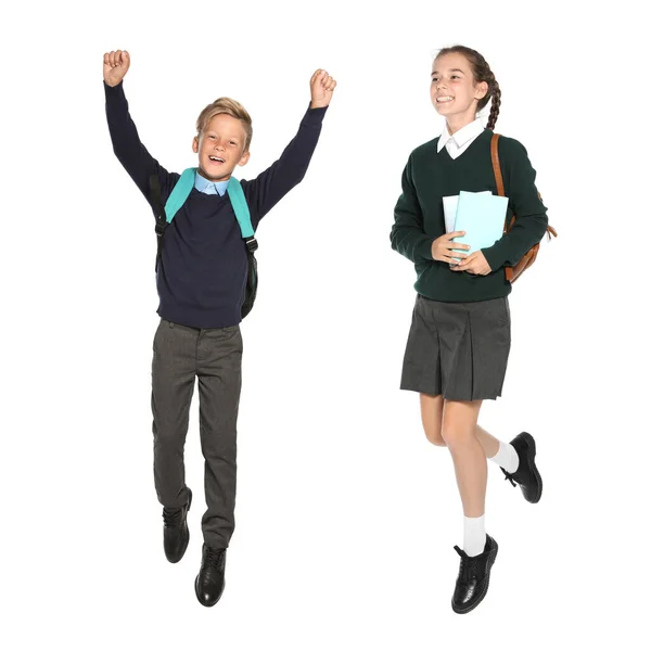 Barn Skolan Uniform Hoppar Vit Bakgrund — Stockfoto