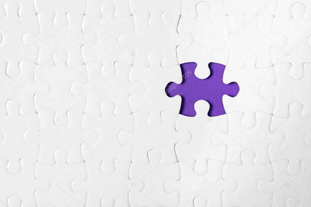 Blank white puzzle with missing piece on purple background, top view. Space for text