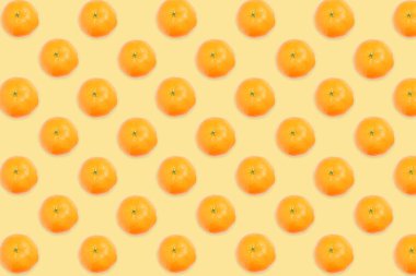 Soluk turuncu arkaplanda mandalina deseni
