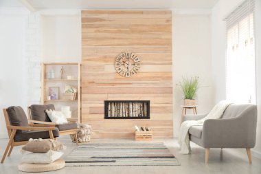 Modern oturma odasının içi şık mobilyalarla dolu.