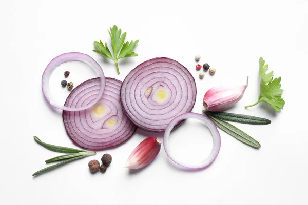 stock image Flat lay composition with cut onion and spices on white background