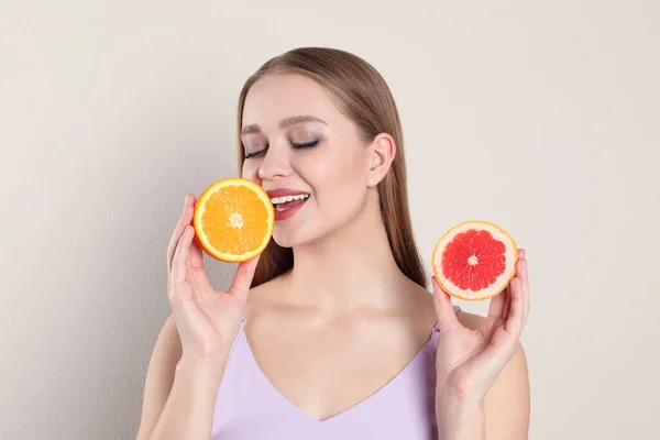 Young Woman Cut Orange Grapefruit Beige Background Vitamin Rich Food — Stock Photo, Image