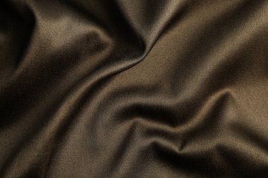 Arka plan olarak güzel kahverengi kumaşın dokusu, yakın plan