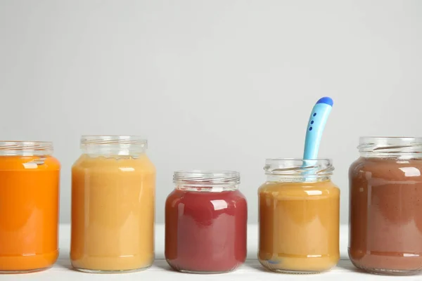 Healthy Baby Food Jars White Wooden Table Grey Background Space — Stock Photo, Image