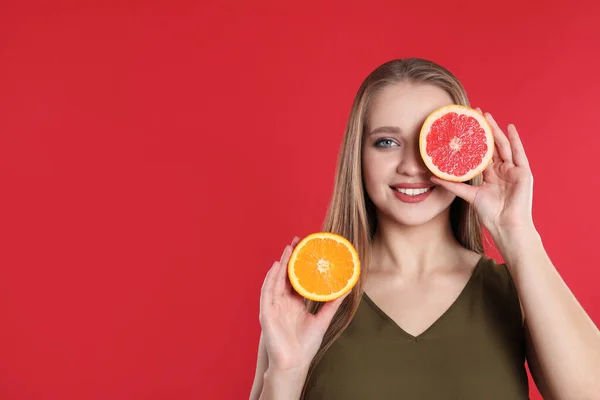 Young Woman Cut Orange Grapefruit Red Background Space Text Vitamin — Stock Photo, Image