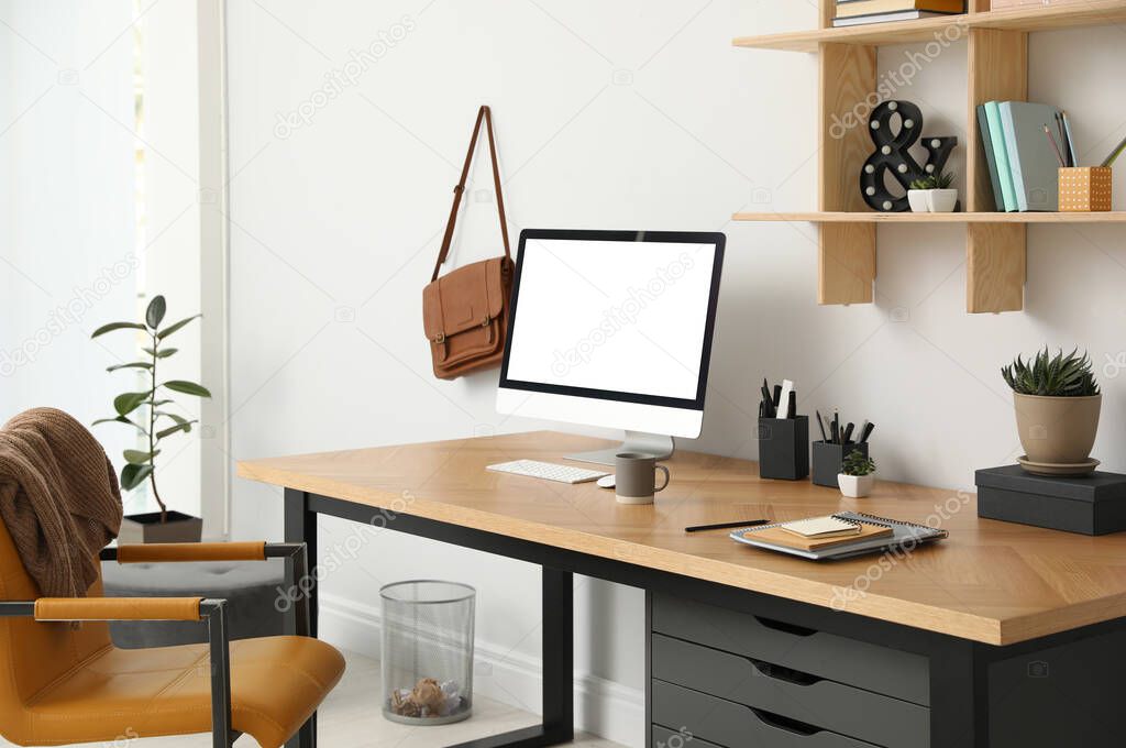 Stylish room interior with modern comfortable workplace