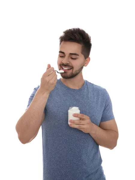 Jovem Feliz Comendo Iogurte Saboroso Fundo Branco — Fotografia de Stock