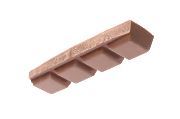 Egy Darab Finom Tejcsokoládé Elszigetelt Fehér — Stock Fotó