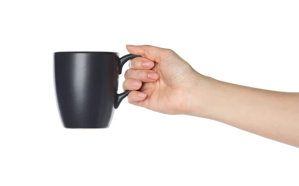 Mujer Sosteniendo Taza Negra Sobre Fondo Blanco Primer Plano — Foto de Stock