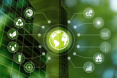 Enerji verimliliği kavramı. Arkaplanda yeşil tonlu simgeler ve bina ile şema
