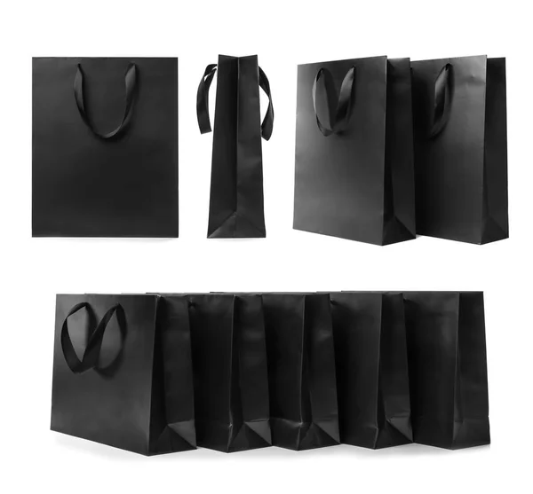 Set Mit Schwarzen Papiereinkaufstaschen Auf Weißem Hintergrund — Stockfoto