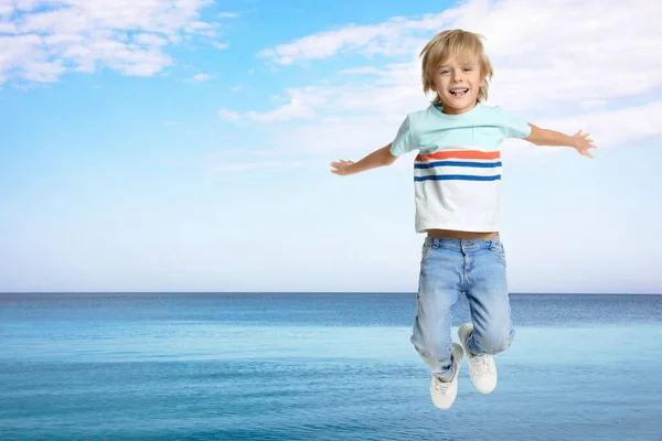 Happy School Boy Jumping Sea Space Text Summer Holidays — Stock Photo, Image
