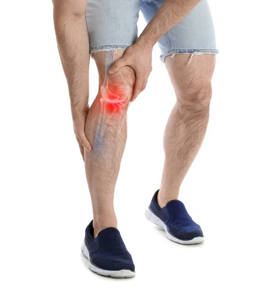 Anak Muda Menderita Nyeri Lutut Pada Latar Belakang Putih Closeup — Stok Foto