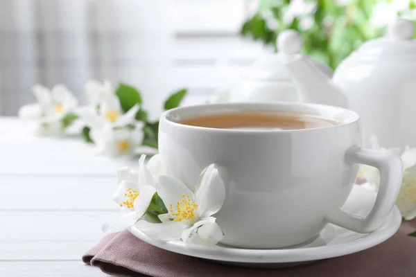 Cup Tea Fresh Jasmine Flowers White Wooden Table — Stock Photo, Image