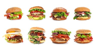 Beyaz arka planda değişik lezzetli hamburgerler.