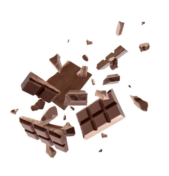 Pedaços Chocolate Leite Caindo Fundo Branco — Fotografia de Stock
