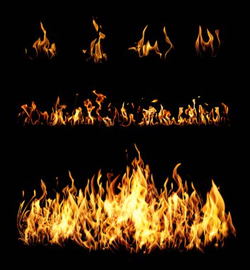 Collection of bright fire flames on black background clipart