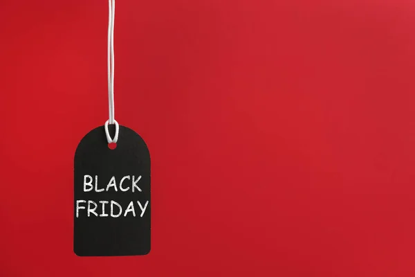 Blank Tag Hanging Red Background Space Text Black Friday Concept — Stock Photo, Image