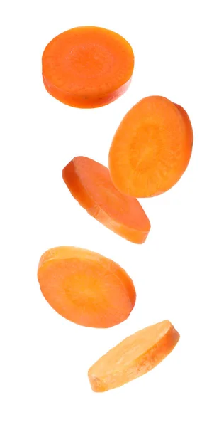 Fresh Carrot Slices Falling White Background — Stock Photo, Image