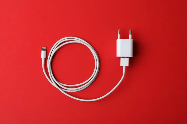 Usb Charger Red Background Top View Modern Technology — Stock Photo, Image