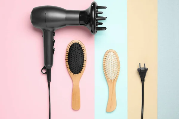 Hair Dryer Different Brushes Color Background Flat Lay Professional Hairdresser — Stock Photo, Image