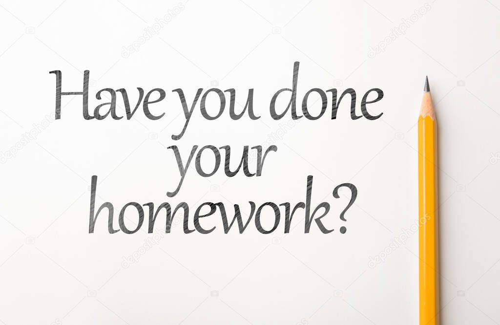Pencil and phrase HAVE YOU DONE YOUR HOMEWORK? on white background, top view 