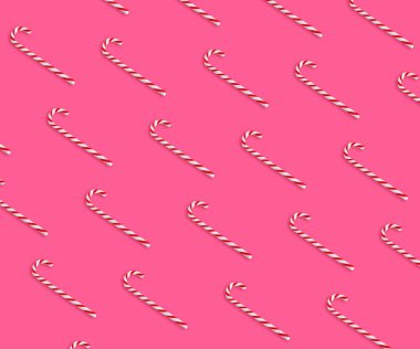 Parlak pembe arka planda Noel şeker kamışları deseni, üst manzara