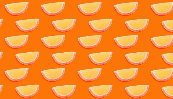 Tasty Jelly Candies Orange Background Pattern Design — Stock Photo, Image