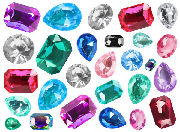 Set of different bright gemstones isolated on white