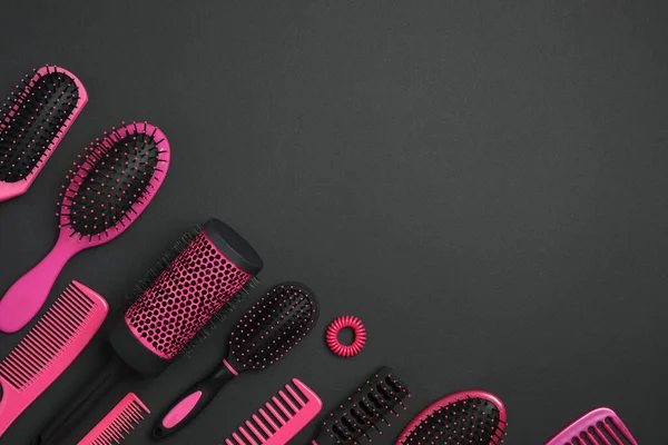 Flat Lay Composition Modern Hair Combs Brushes Black Background — Stock Photo, Image
