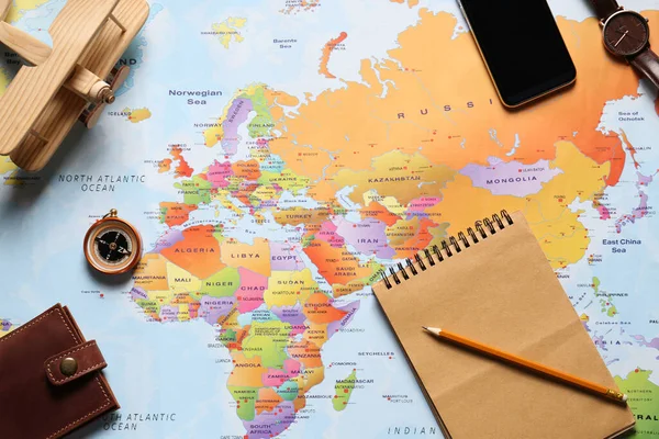 Flat Lay Composition Notebook Different Items World Map Trip Planning — Stock Photo, Image