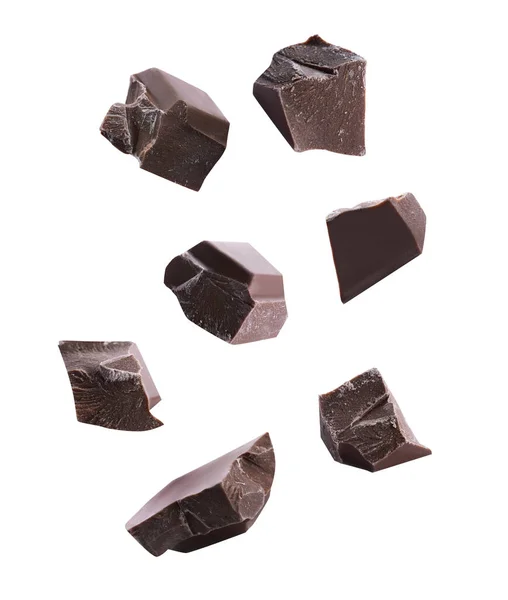 Κομμάτια Νόστιμης Μαύρης Σοκολάτας Που Πέφτουν Λευκό Φόντο — Φωτογραφία Αρχείου