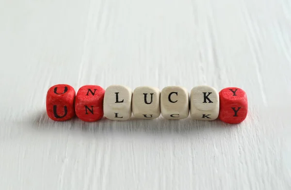 Red White Cubes Word Unlucky White Wooden Table Space Text — Stock Photo, Image