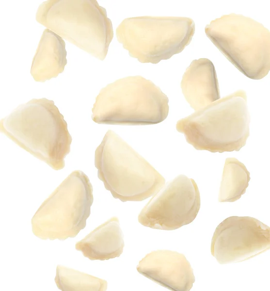 Many Tasty Dumplings Falling White Background — Stock Photo, Image