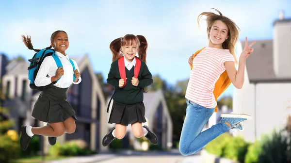 Happy Girls Jumping Street School Holidays — Stock Photo, Image