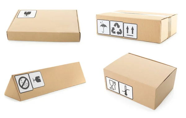 Conjunto Caixas Papelão Com Símbolos Embalagem Sobre Fundo Branco — Fotografia de Stock