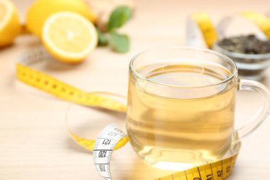 Masada diyet bitki çayı ve mezura, yakın plan. Metin için boşluk