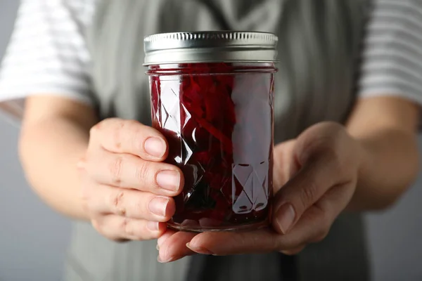 Woman holding glass jar with pickled beets, closeup — Stock Image Woman Holding Glass Jar Pickled Beets Closeup Stock Picture