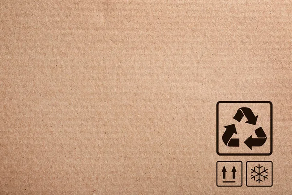 Caja Cartón Con Símbolos Embalaje Como Fondo Primer Plano — Foto de Stock